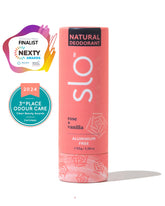 A pink tube of SLO Natural Deodorant with rose and vanilla flavors, displaying awards and certifications.